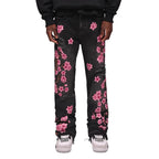 Men's high-street ripped jeans with floral embroidery patchwork, trendy street-style distressed flared jeans