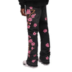 Men's high-street ripped jeans with floral embroidery patchwork, trendy street-style distressed flared jeans